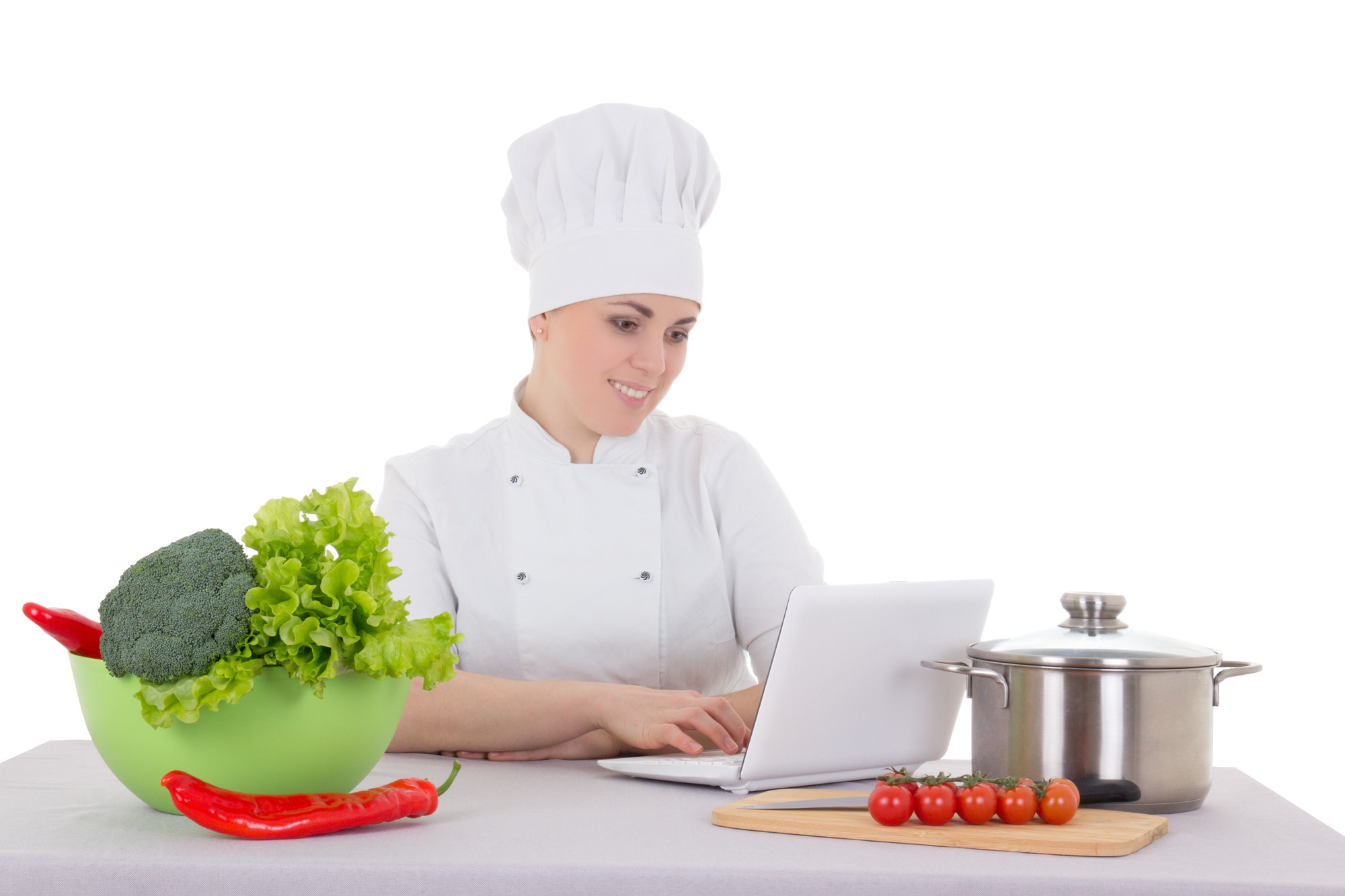 Chef teaching online with laptop and ingredients